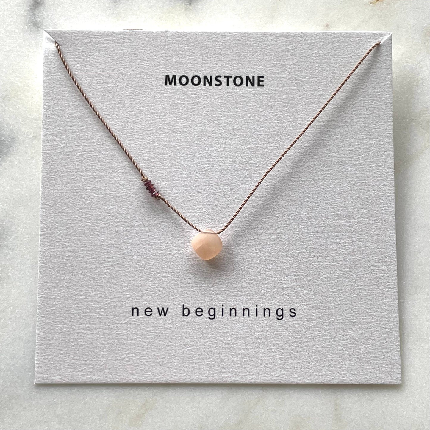 Peach Moonstone and Garnet New Beginnings Necklace