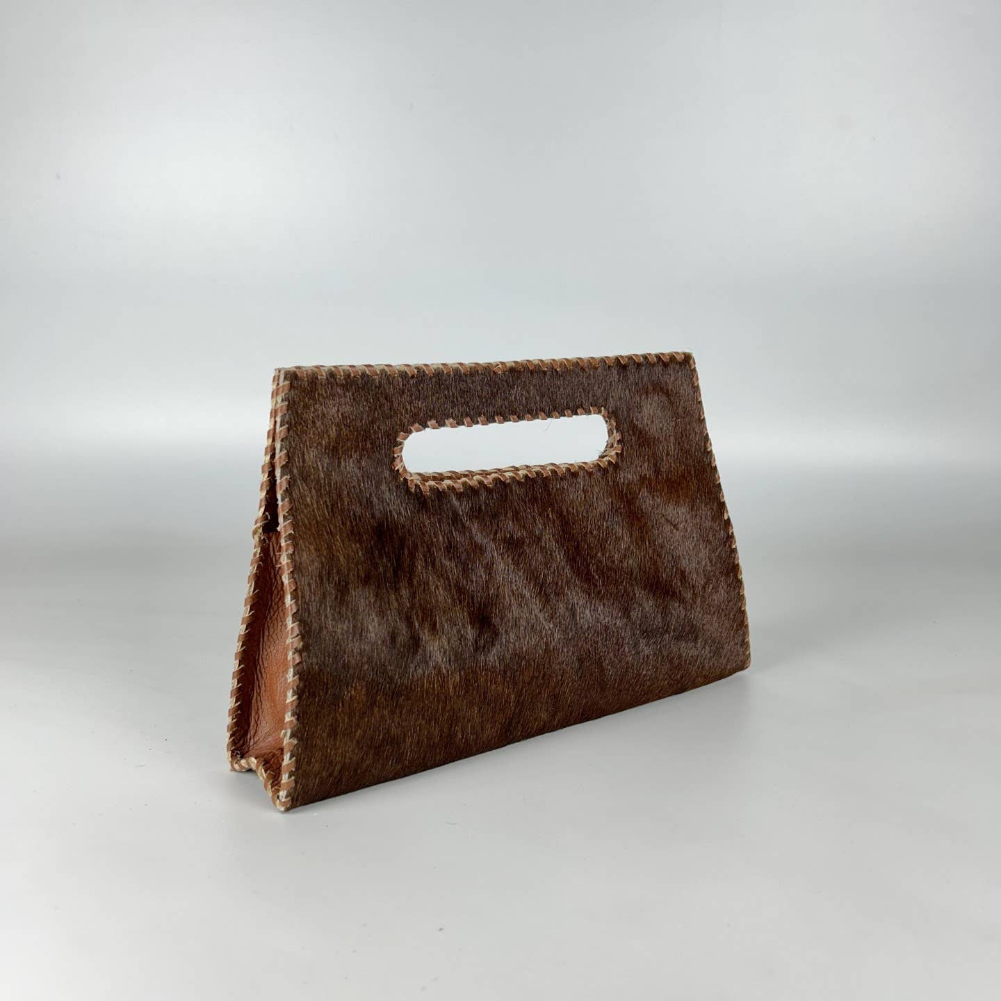 Mia Clutch Cowhide Hairon Leather