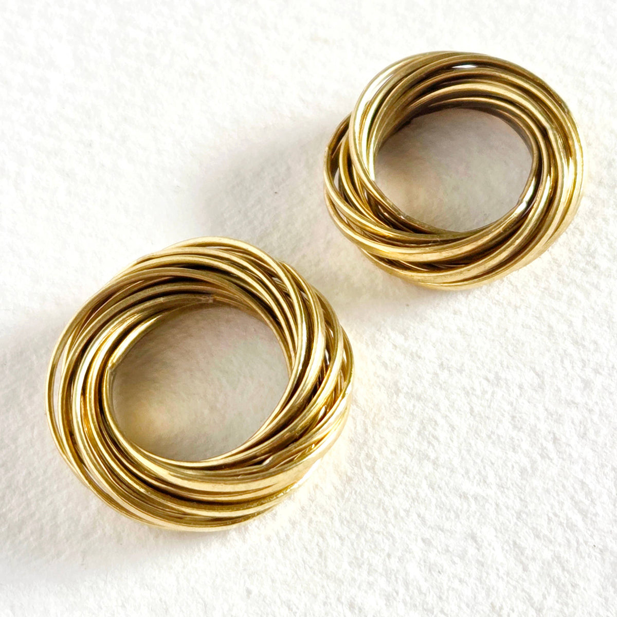 Brass ring intertwined 12 band infinity bisjoux