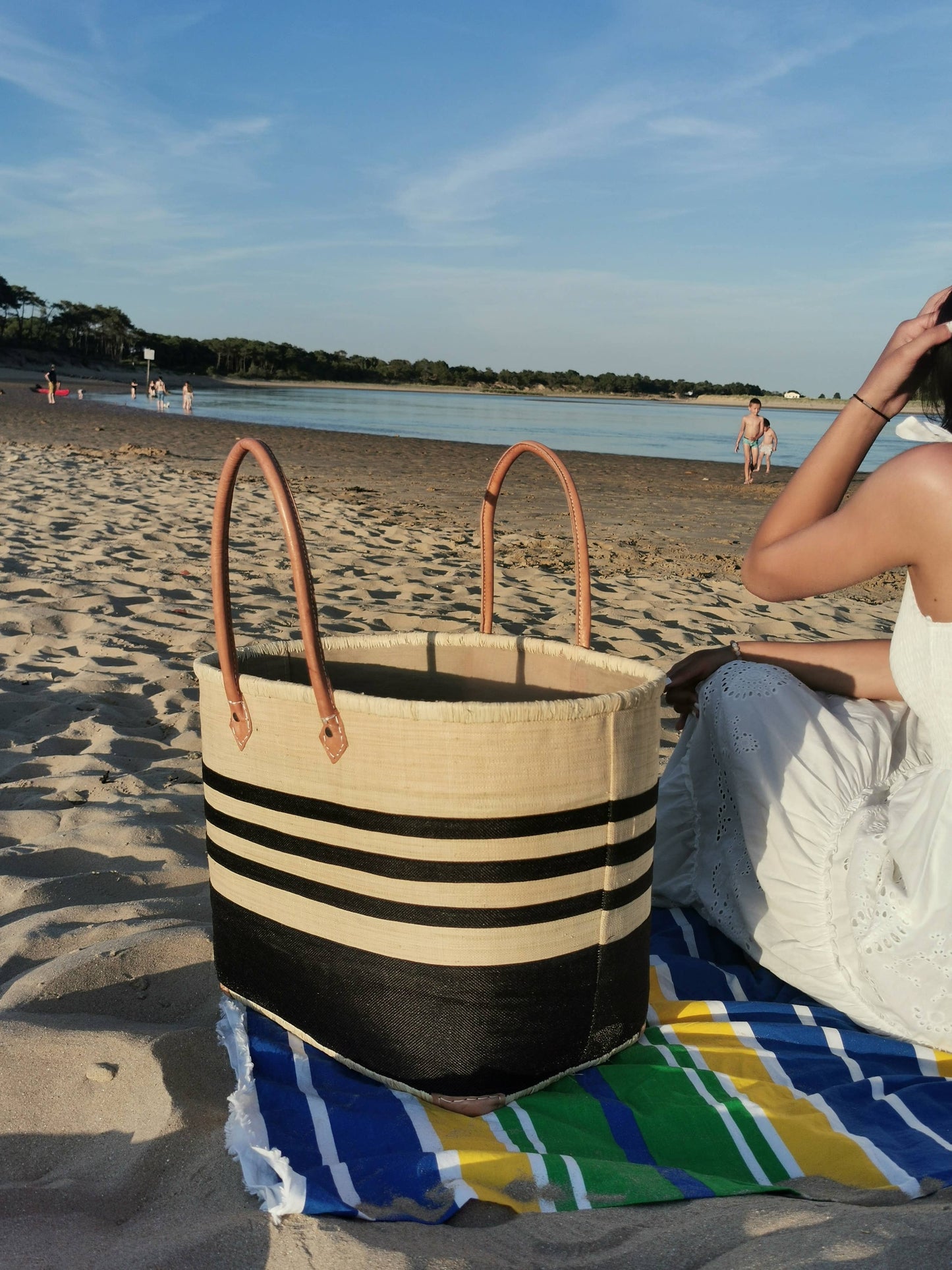 Woven straw tote basket