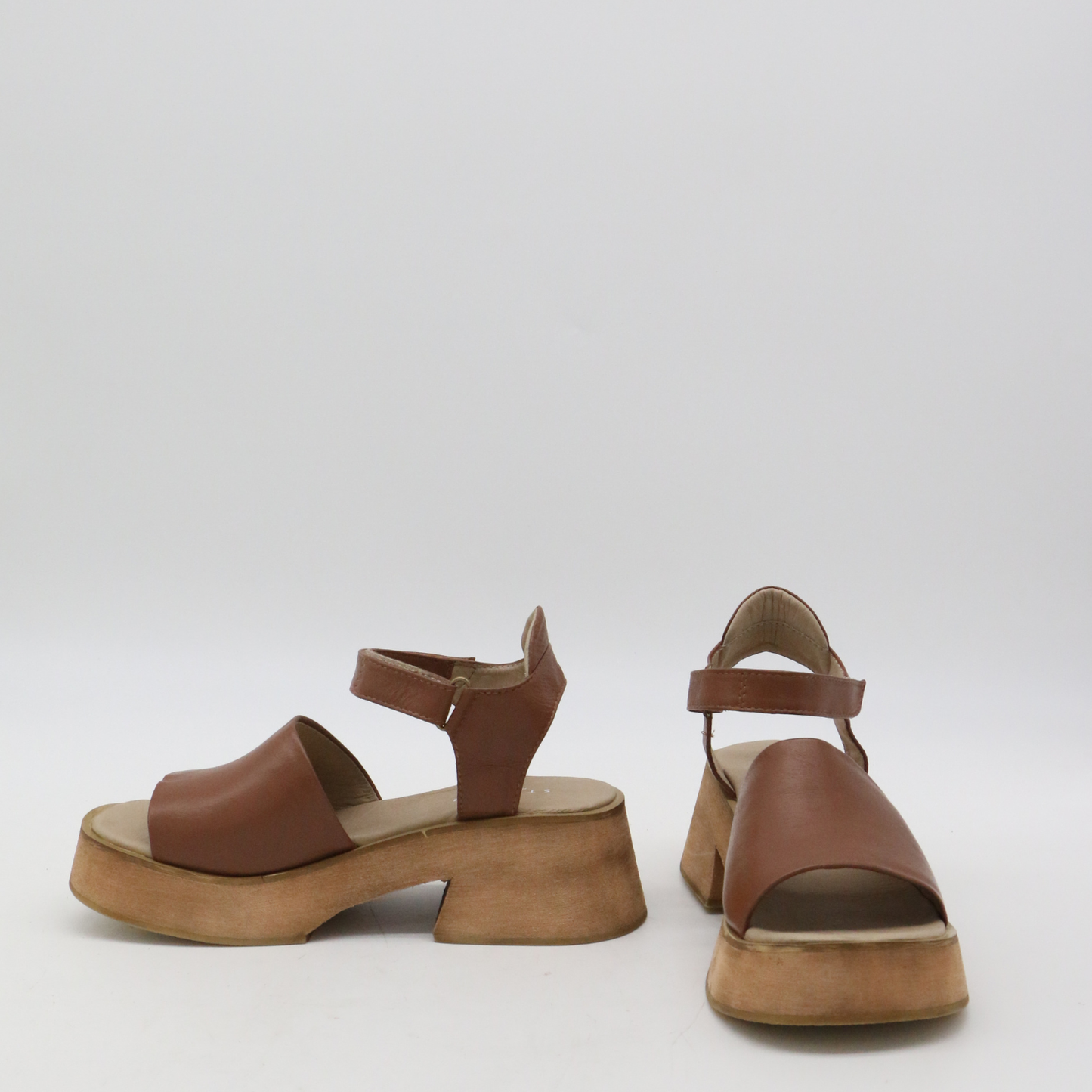 Tribe clog-inspired platform strap-on sandals in tan leather