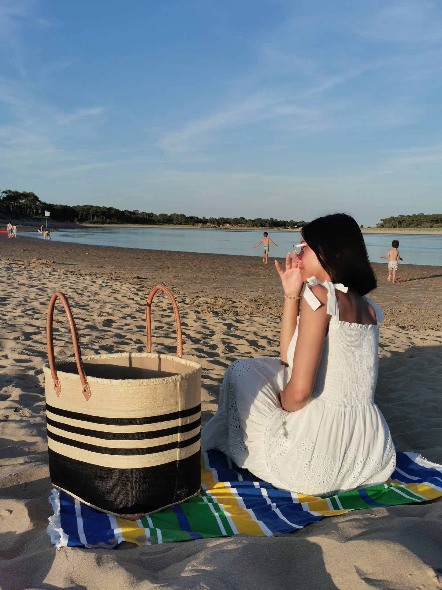 Woven straw tote basket